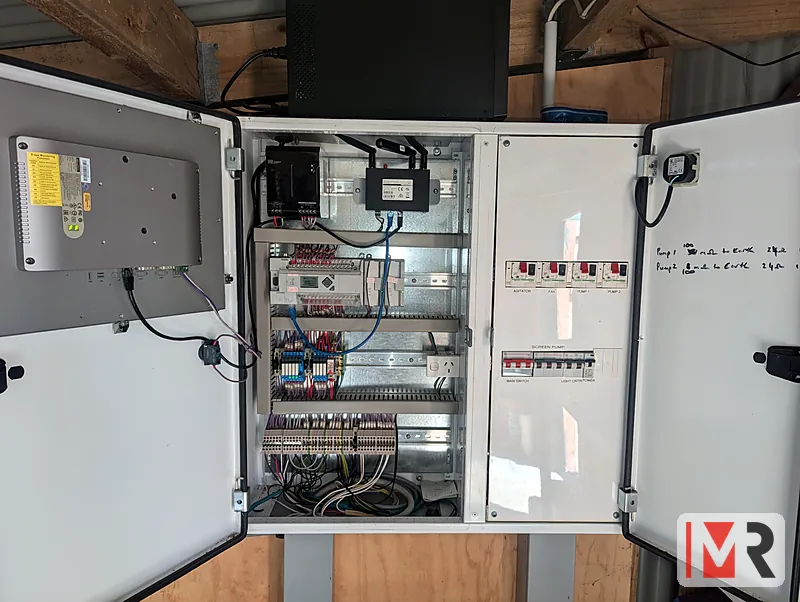 Two-door control panel with controller, breakers and power supplies