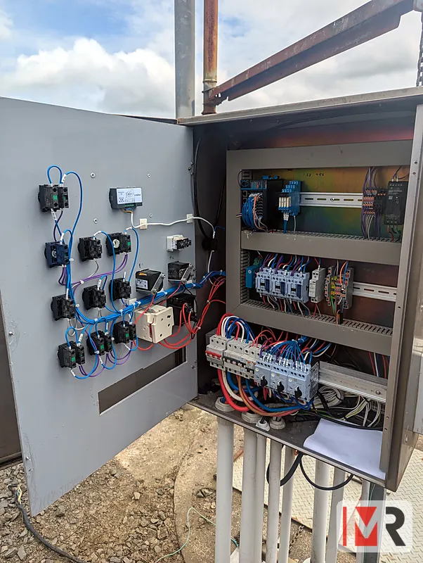 Outdoor pole-mounted control panel with indicators and breakers