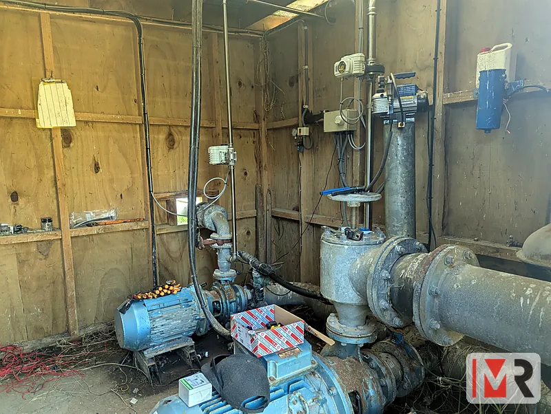 Pump shed with electric motor driven pumps and large pipework