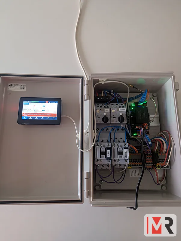 Modbee touchscreen pump controller in an enclosure with contactors